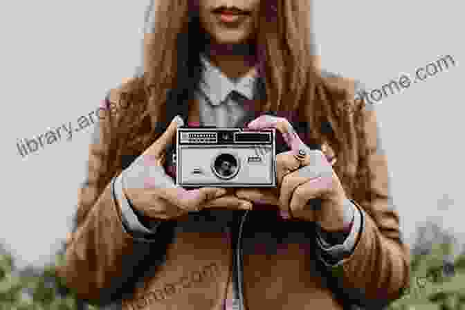 A Black And White Photograph Of A Young Ard Emery Holding A Camera Iosco County: The Photography Of Ard G Emery 1892 1904 (Images Of America)