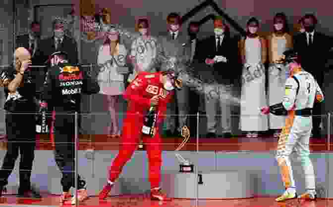 A Formula 1 Driver Celebrating His Victory At The Monaco Grand Prix The Life Monaco Grand Prix