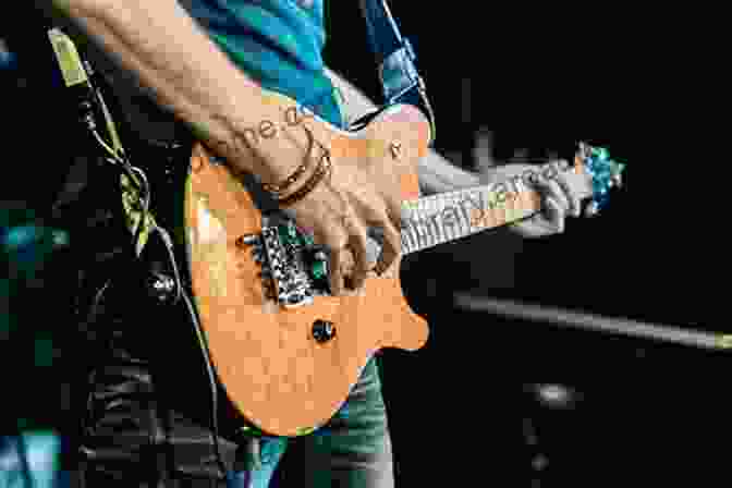 A Guitar Player Shredding On A Stage Compelled To Play: The Building Of A Guitar Player