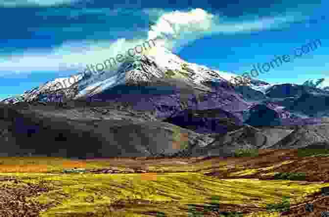 A Volcanic Landscape, With A Volcanic Crater In The Foreground And A Mountain Range In The Background. Volcanoes In Pictures