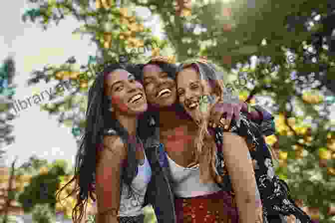 A Young Woman Smiling And Laughing While Sitting In A Group Of Friends Out From Under