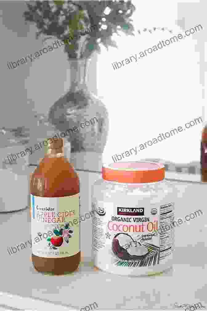 Apple Cider Vinegar And Coconut Oil In Glass Bottles Apple Cider Vinegar And Coconut Oil