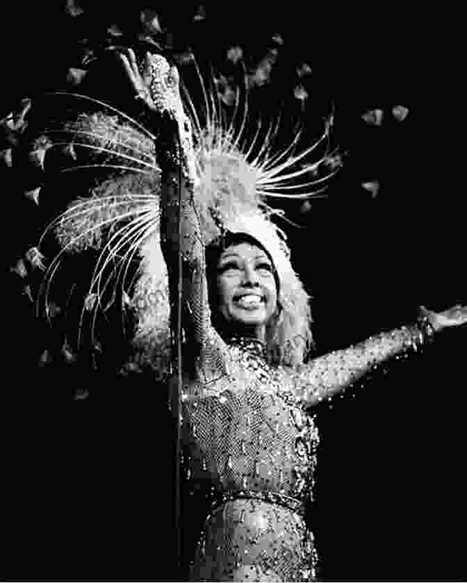 Josephine Baker Performing On Stage, Captivating The Audience With Her Dynamic Dance And Exuberant Charisma. Josephine Baker S Cinematic Prism