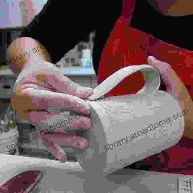 Pottery Artist Using Handbuilding Techniques BEGINNERS GUIDE TO CERAMICS: Complete Guide To Transforming Clay Into Unique Piece Of Artwork